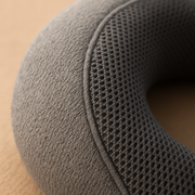 Close-up of the LUREXO Travel Pillow's breathable mesh panel and soft fabric